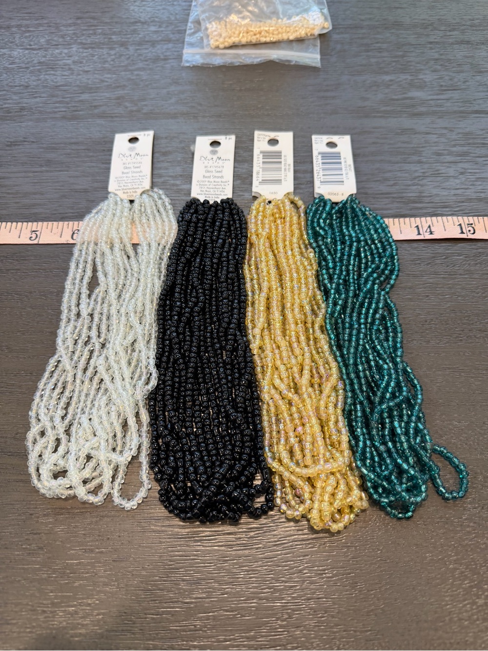 Blue Moon 4 Glass Seed Bead 28 Strands White Black Gold Teal Iridescent Shiny